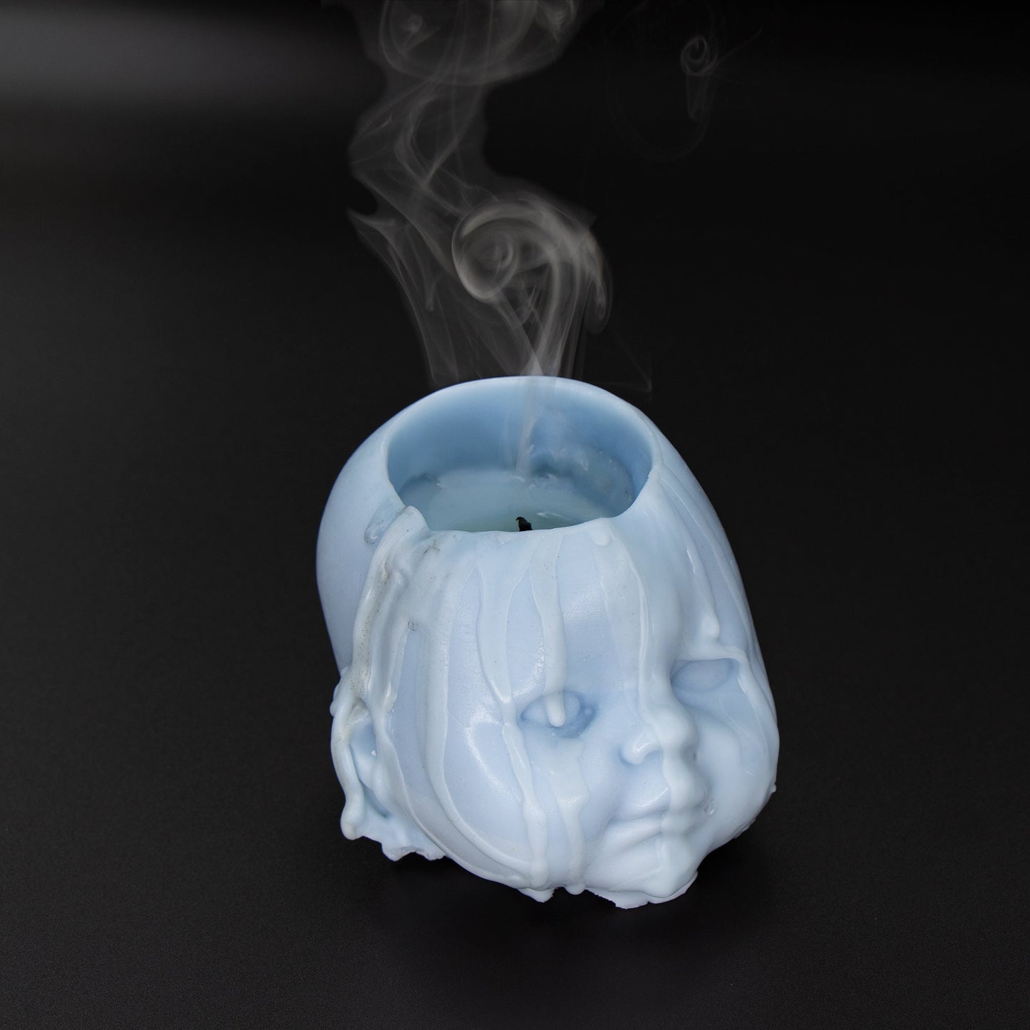 Baby head candle. Cute and Creepy.